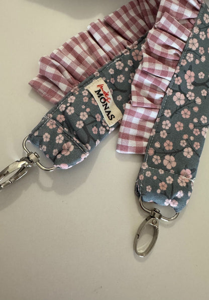 Portamóvil muñeca Flor Gris